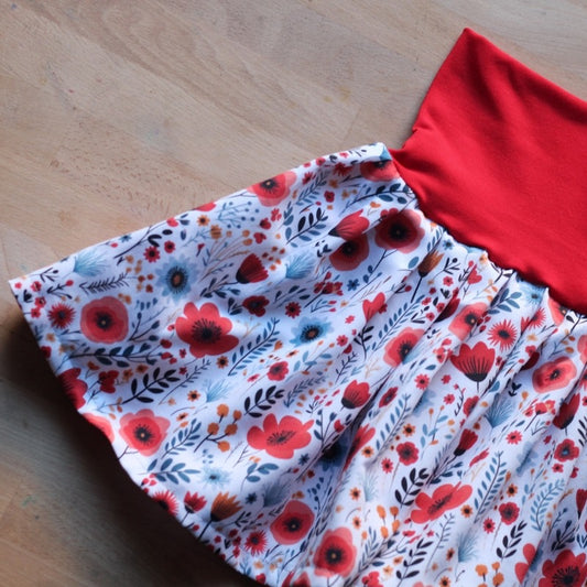Jupe d'été joyeuse à motifs de coquelicots rouges