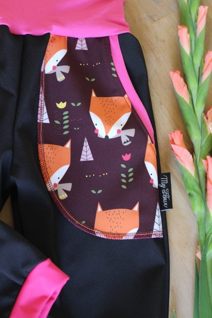 Pantalon softshell noir, renards roses