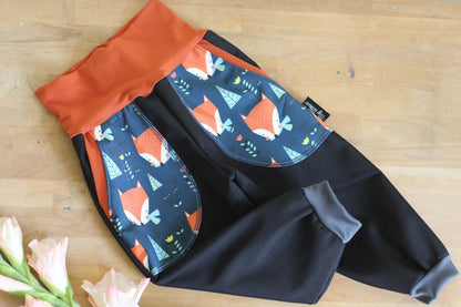 Pantalon softshell noir, renards pétrole