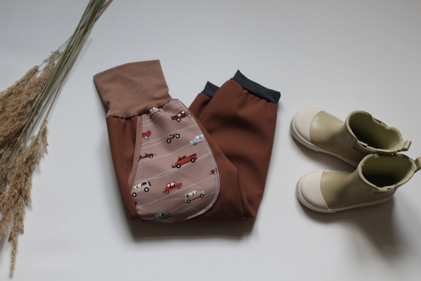 Brown softshell trousers, cars