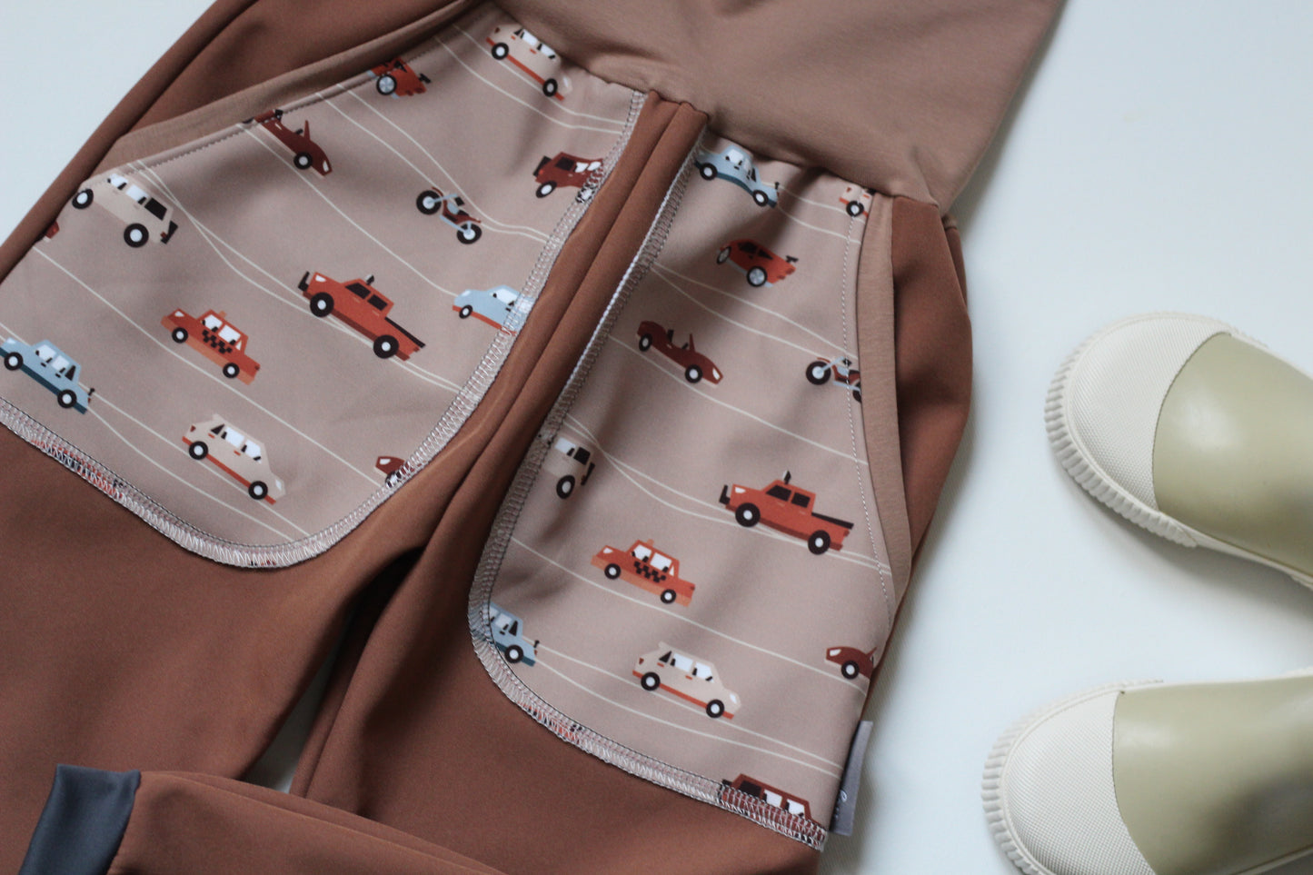 Brown softshell trousers, cars