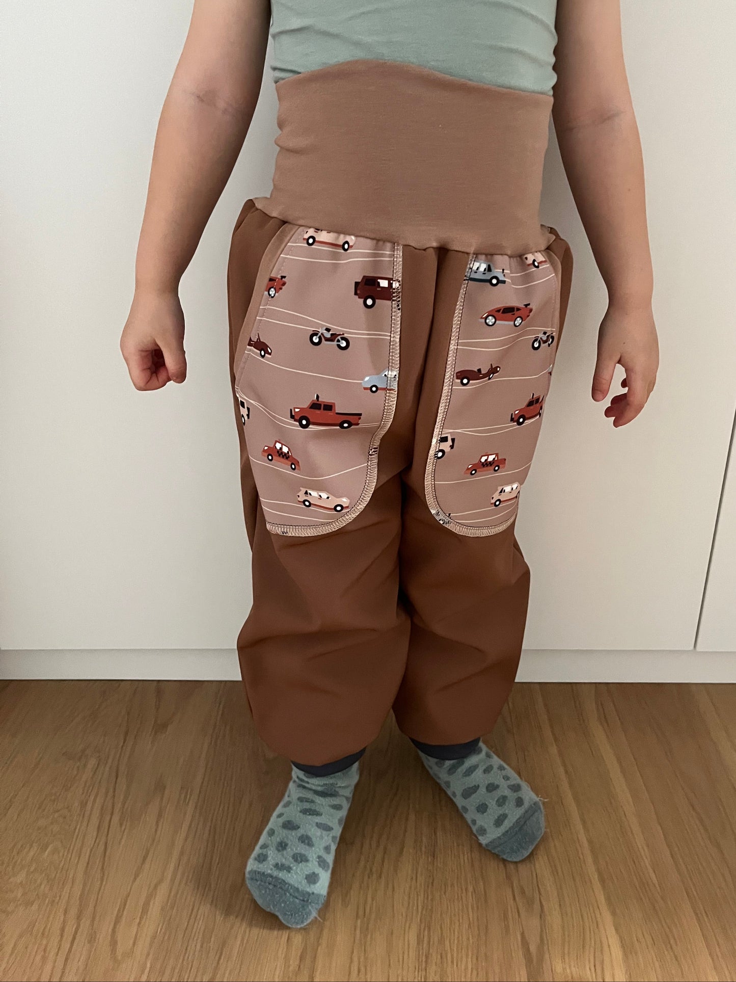 Brown softshell trousers, cars