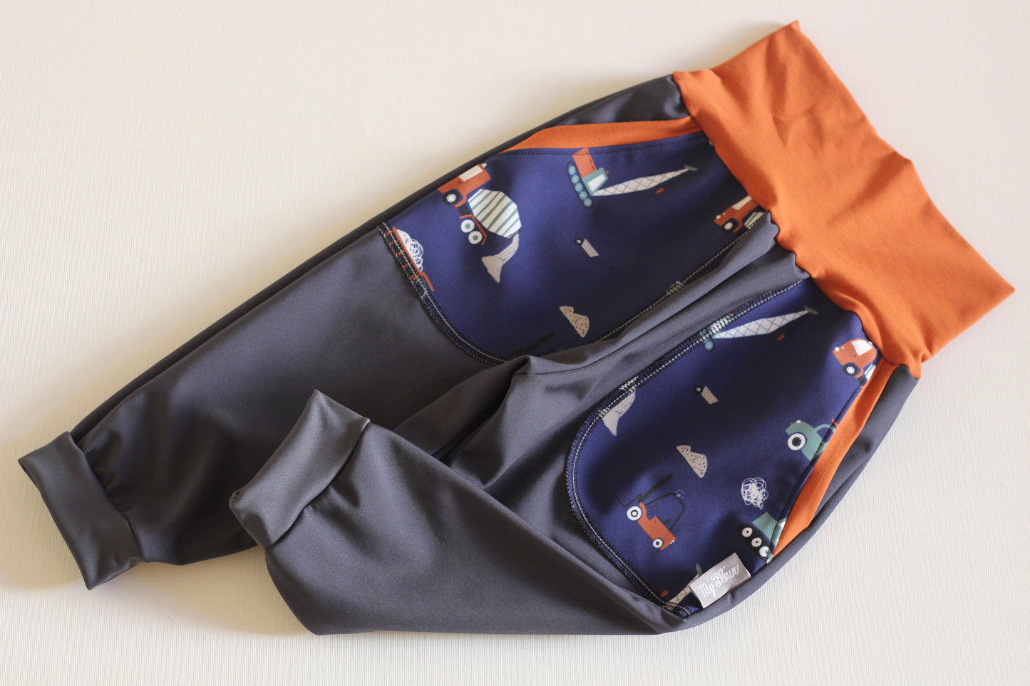 Black softshell trousers, petrol foxes